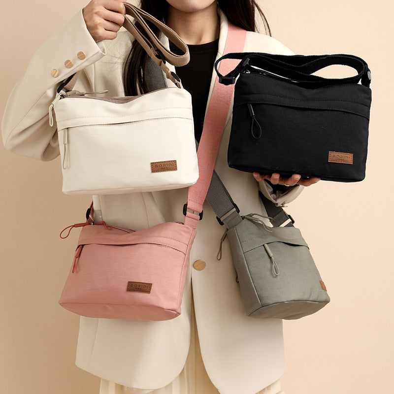 Pink Women Lightweight Nylon Crossbody Bag with Multiple Pockets Compact Shoulder Bag for Travel and Daily Essentials in Australia
